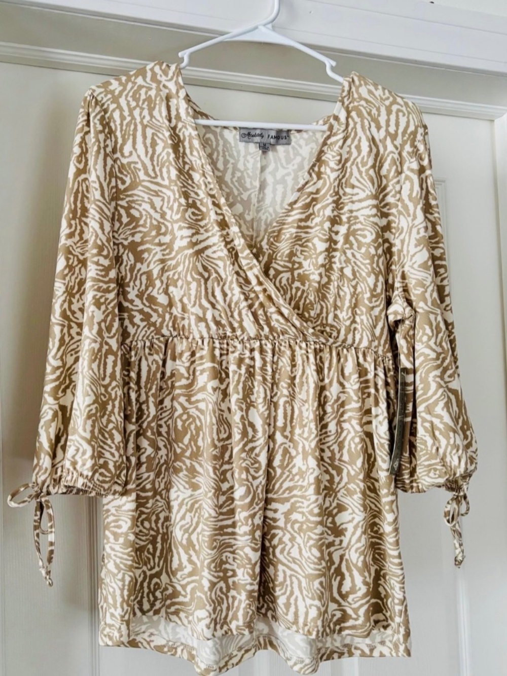NEW Almost Famous Top 3/4 Sleeves Zebra Print V Neck Sz M.